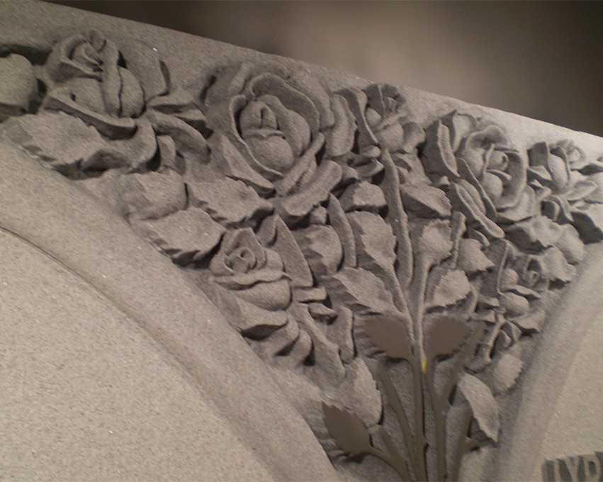 Rose engraving in a gravestone