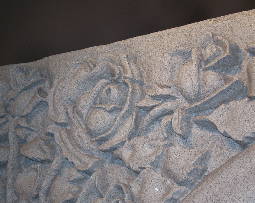 Rose engraving in a gravestone